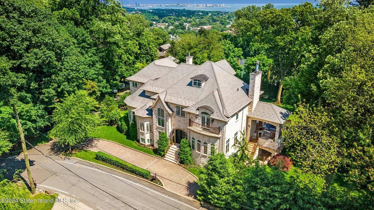 Wow, Look at This Stone Mansion Tucked Amidst Lush Greenery