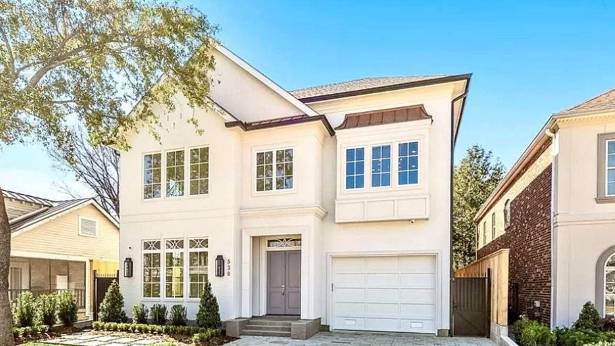 Check Out the Copper Awning Trim on This Elegant White Facade