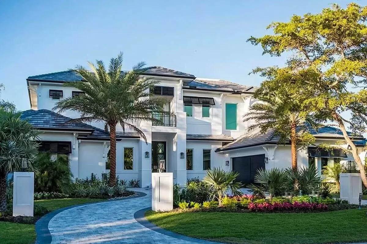 Modern Tropical Escape with Striking Black Shutters