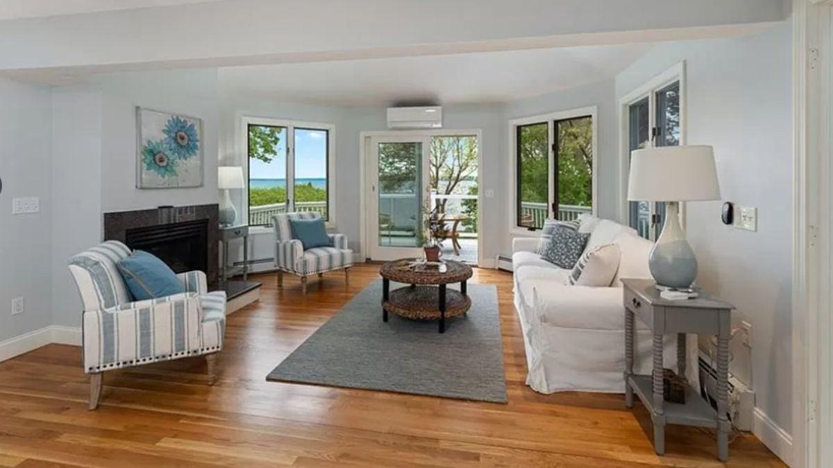 Look at This Cozy Living Room with Bay Views and a Fireplace