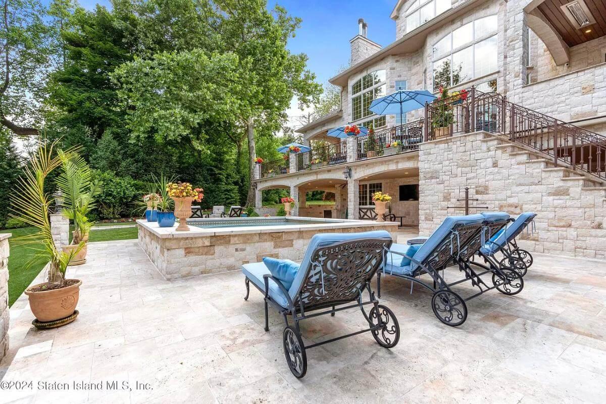 Notice the Luxurious Patio with Poolside Lounging