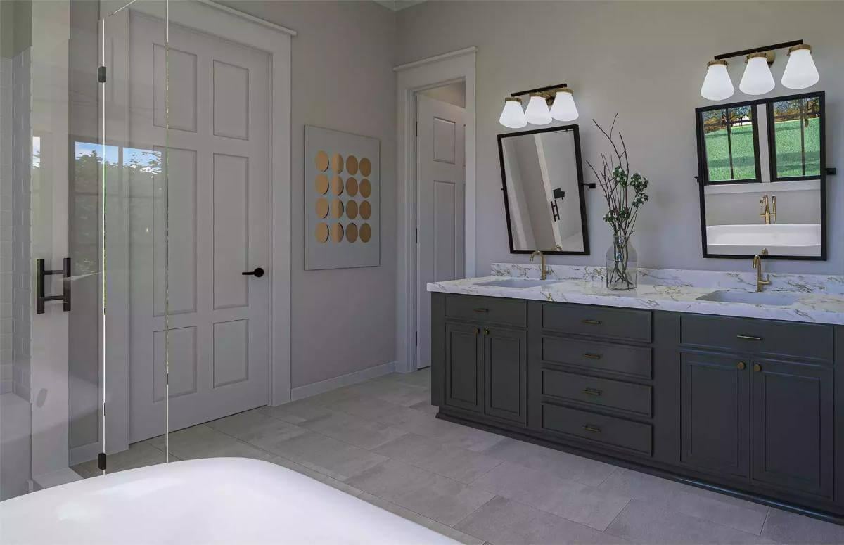 Marble Countertops and Coordinated Lighting in This Elegant Bathroom
