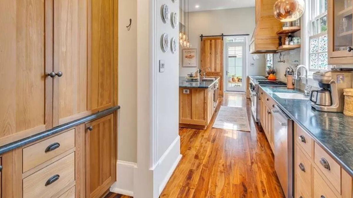 Explore the Rustic Charm of This Kitchen with Sliding Barn Door