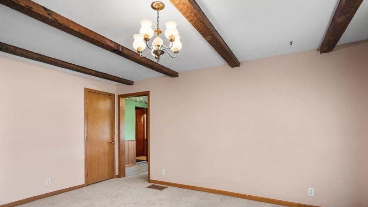 Check Out the Charming Exposed Beams and Chandelier