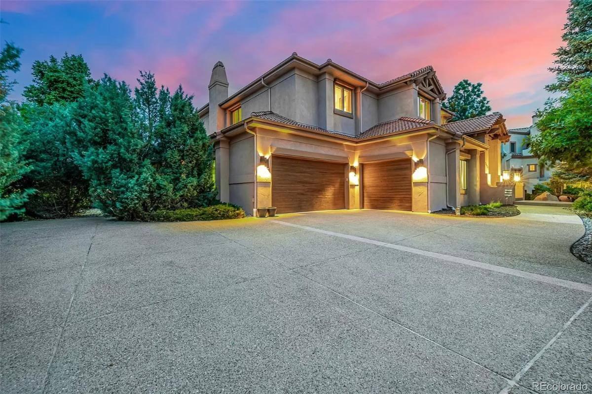 Evening Glow on a Stucco Elegance with Wood Accents