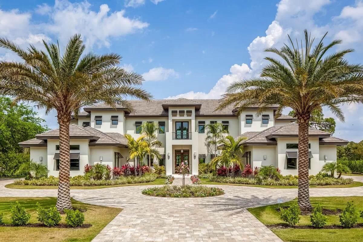 Tropical Elegance with Symmetrical Design and Lush Landscaping