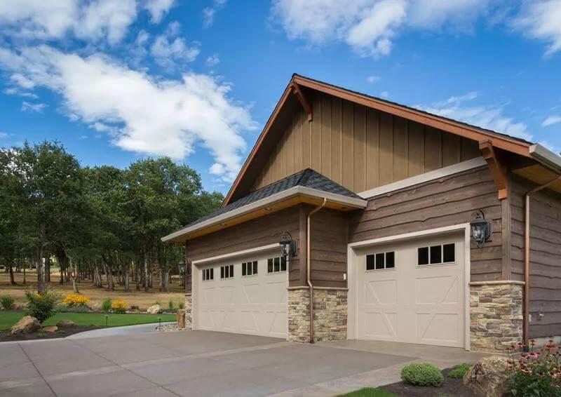 Notice the Detailed Stonework on This Craftsman Garage Exterior