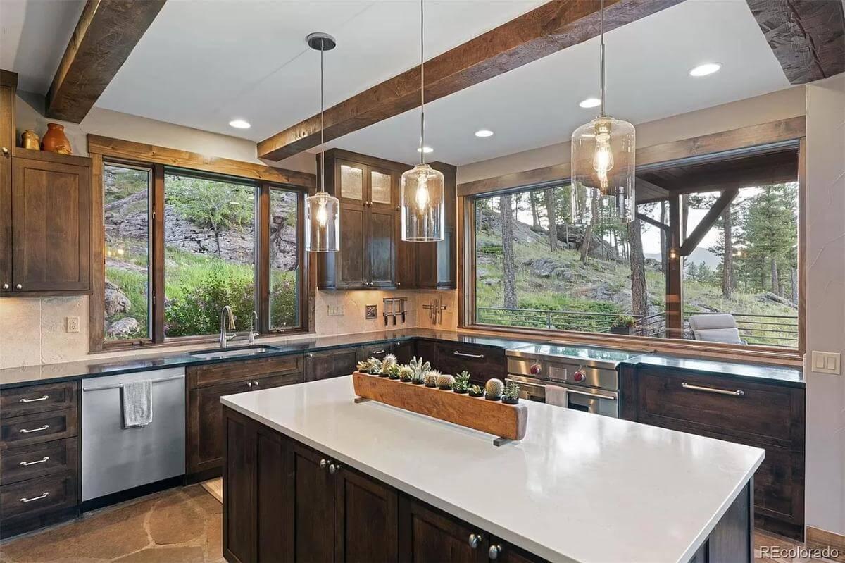 Mountain-View Kitchen with Rustic Beams and Glass Accents