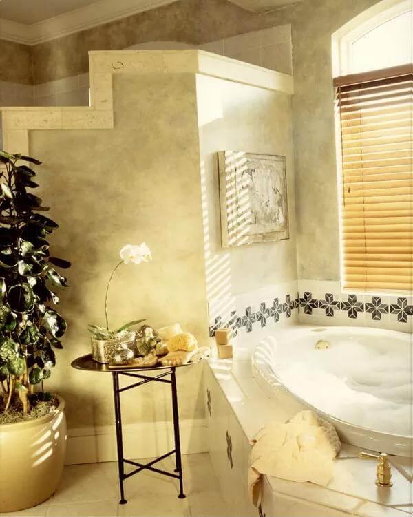 Sunlit Bathroom Retreat Featuring a Luxurious Spa Tub