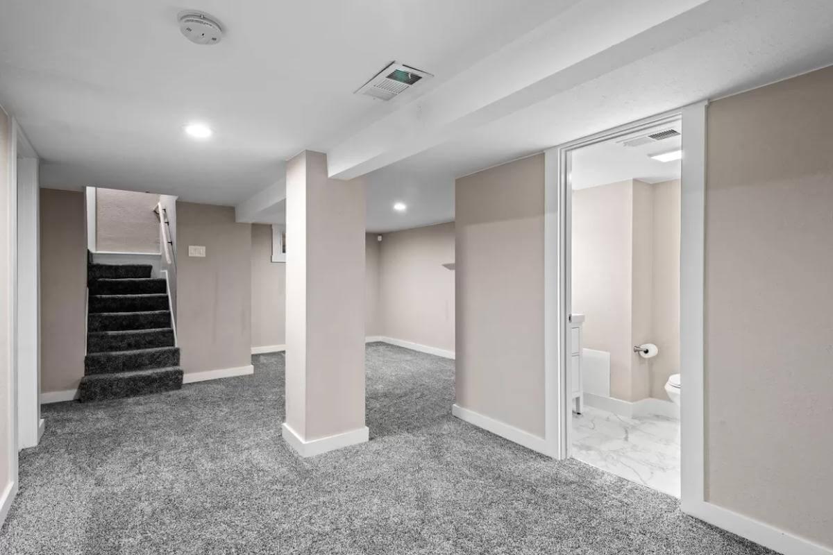 Basement Bonus Room with Plush CarpetingโPerfect for Your Next Project
