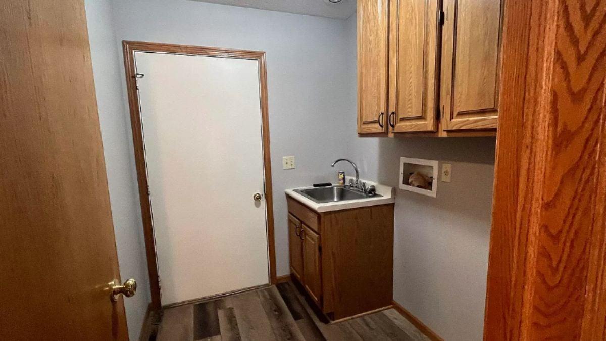 Functional Laundry Room with Handy Utility Sink