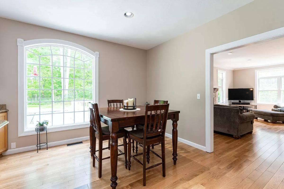 Discover the Charm of This Dining Nook with a Picturesque Window