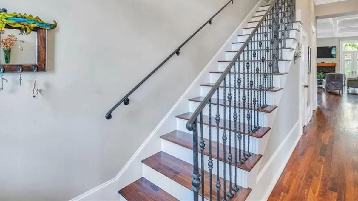 Notice the Intricate Ironwork on This Elegant Staircase