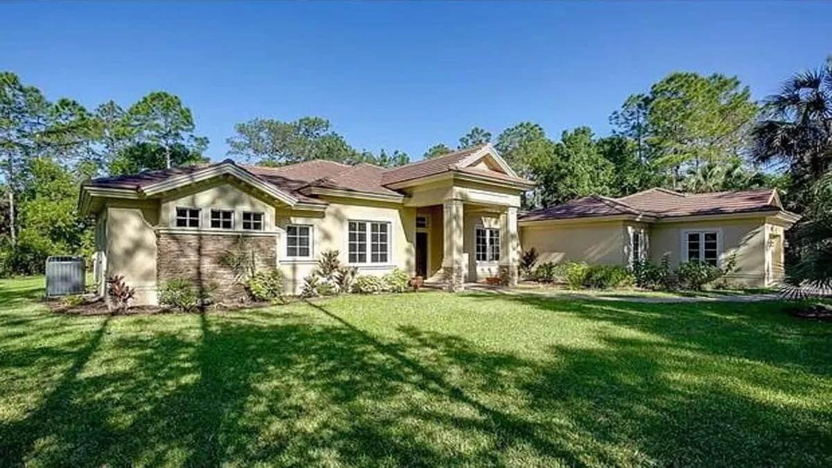 Check Out the Stately Columns Framing This Ranch Style Home