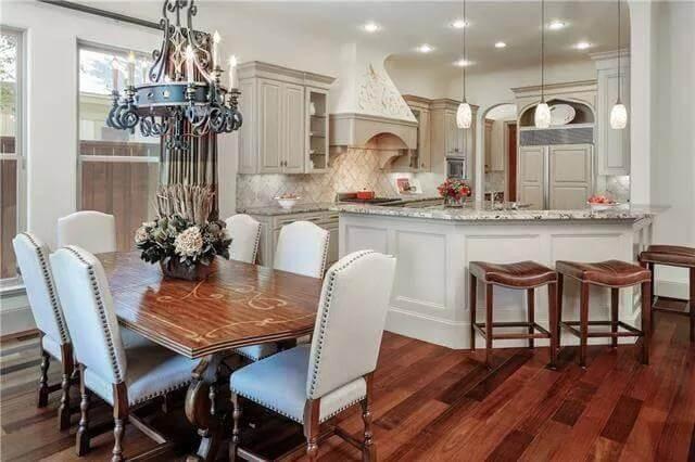 Charming Dining Room Connects Seamlessly to the Elegant Kitchen