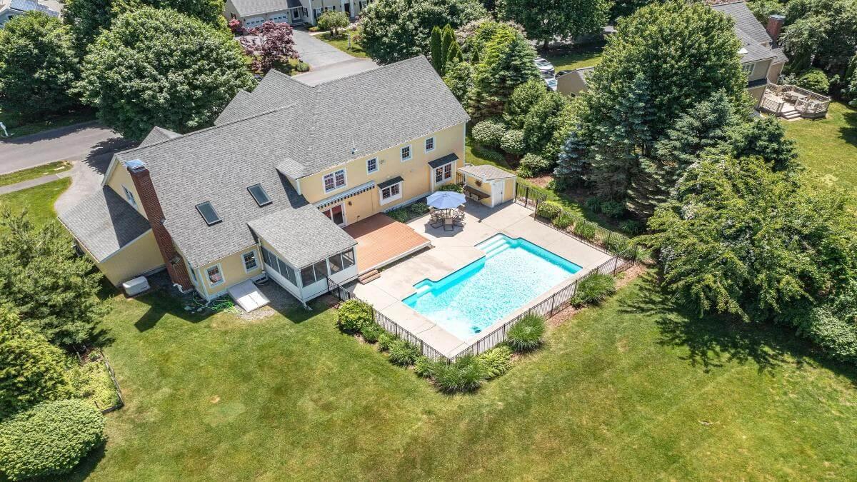 Take a Peek at This Spacious Backyard with a Pool for Summer Fun