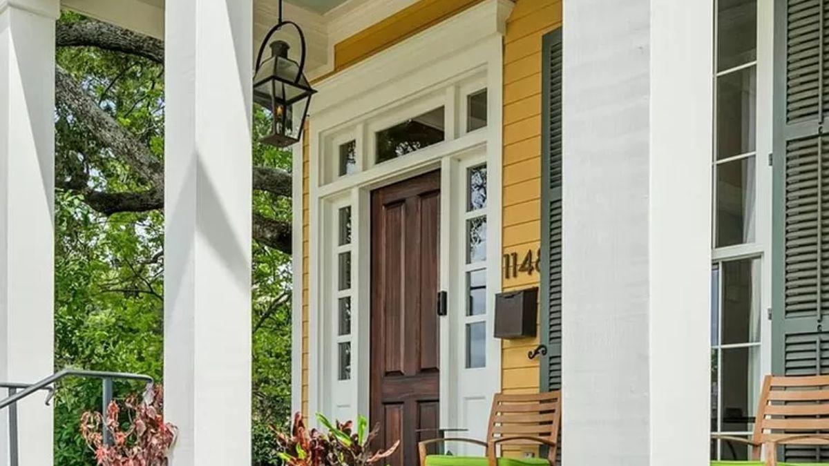 Check Out the Welcoming Entryway with Its Timeless Lantern Lighting