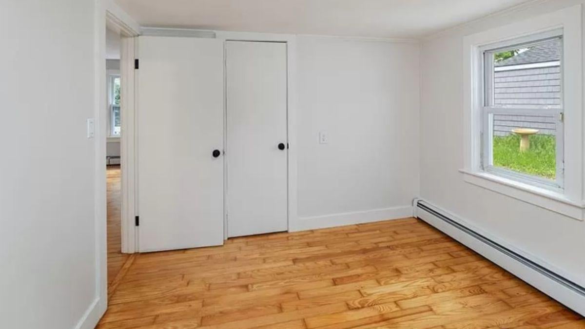 Simple Craftsman Room with Hardwood Floors and Clean Lines