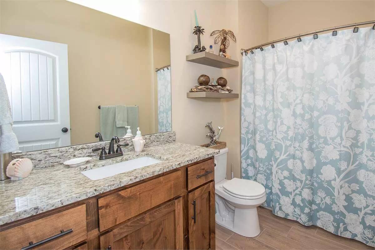 Notice the Subtle Elegance of Granite in This Bathroom