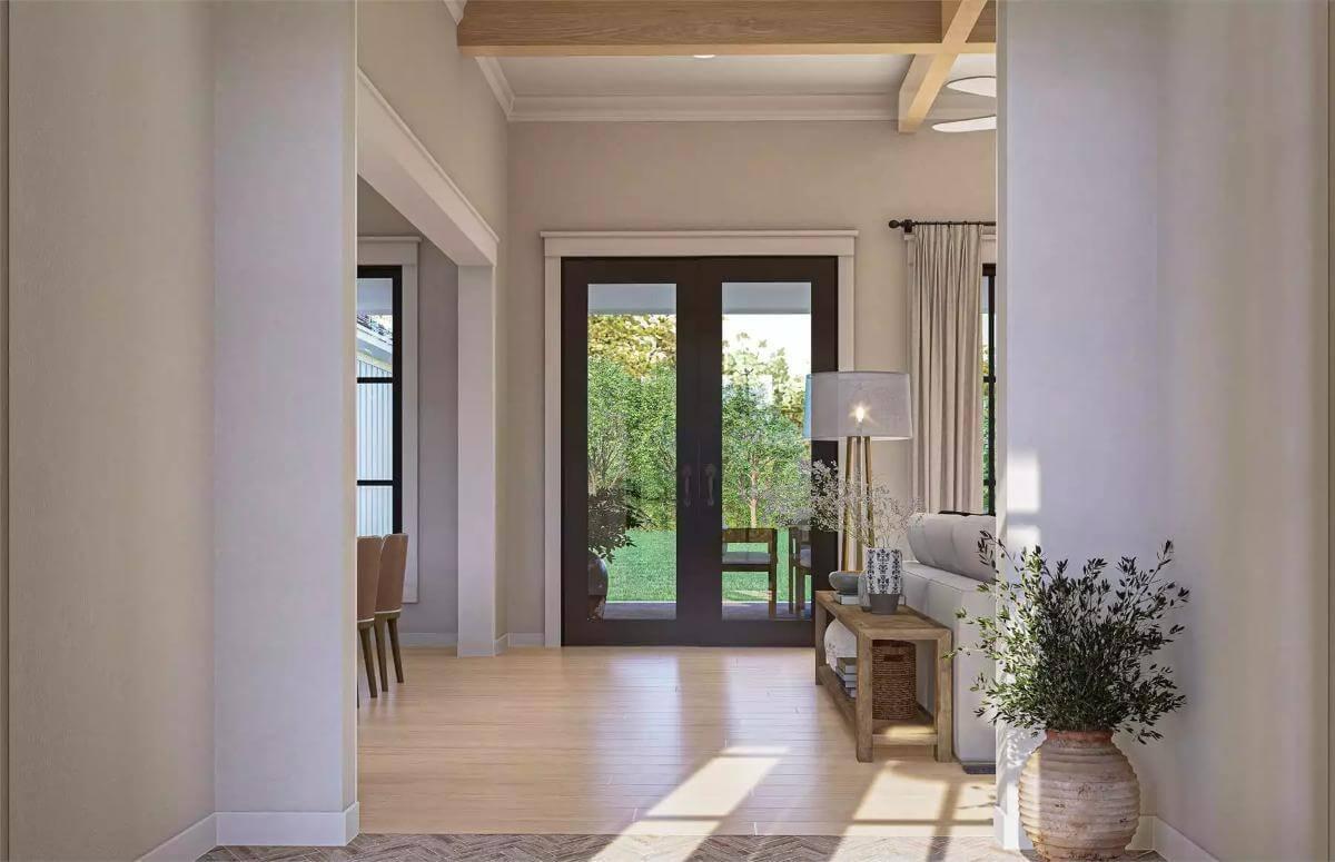 A Crafted Entryway with Expansive Glass Doors