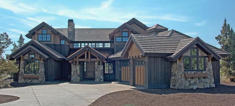 Admire This Craftsman Facade Featuring Exposed Timber and Rugged Masonry