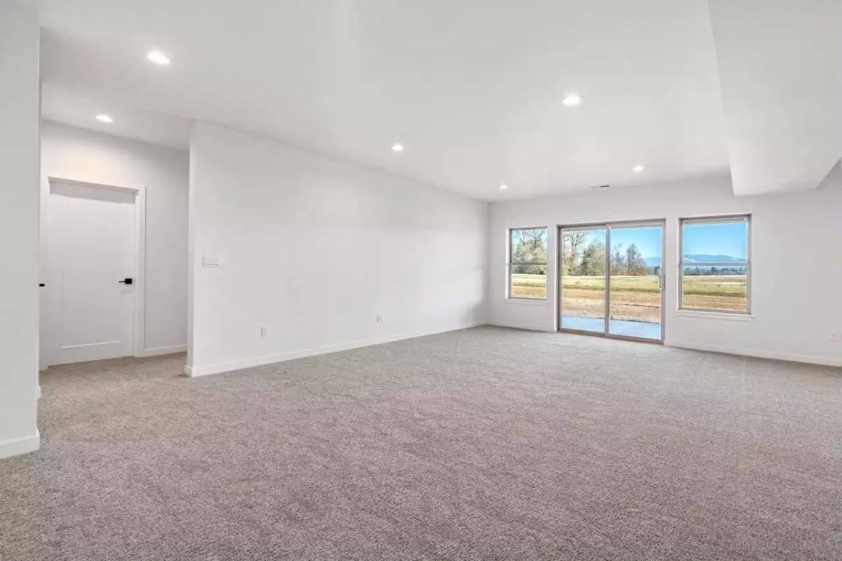 Discover the Open Potential of This Sunlit Basement Living Area