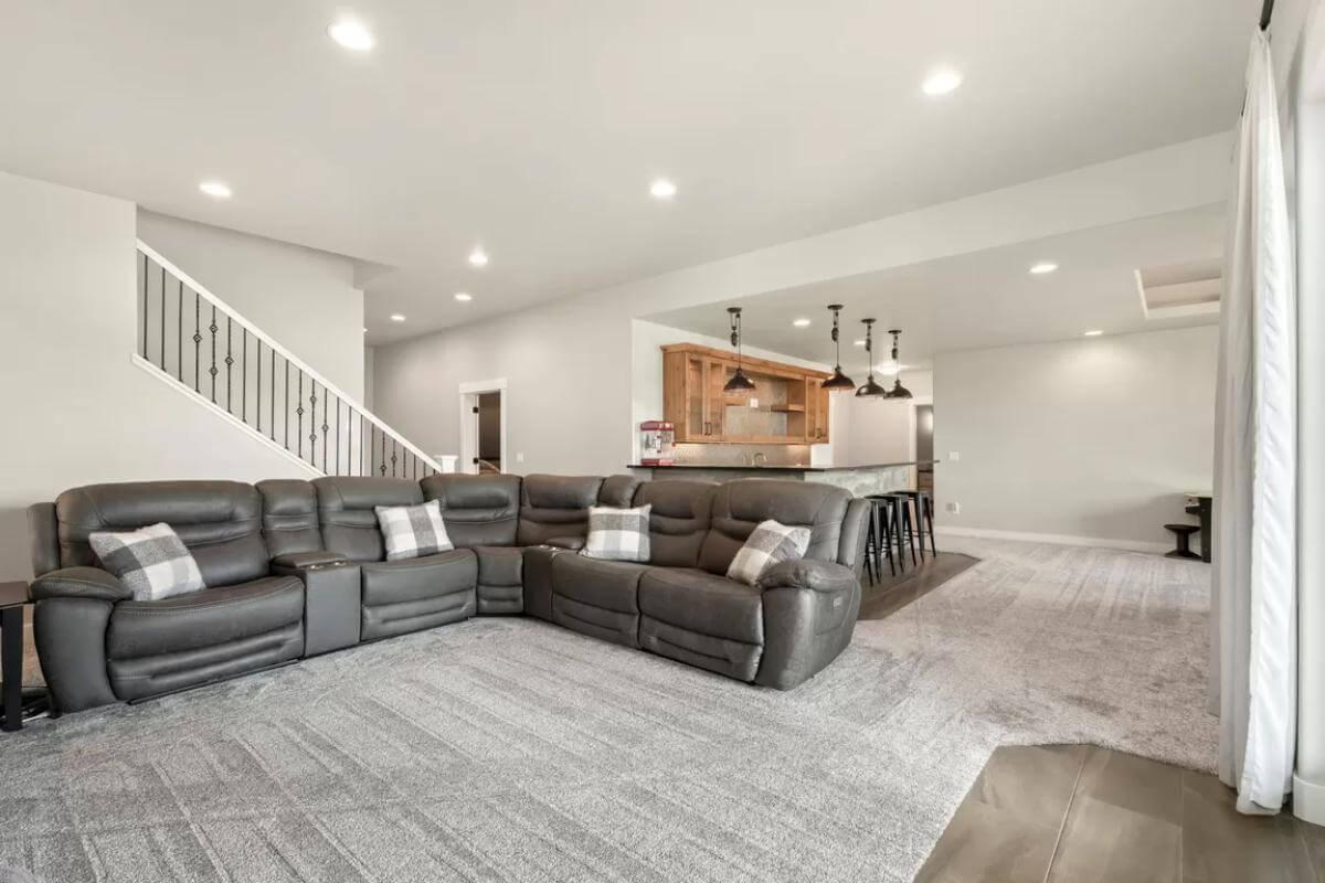 Relax in the Spacious Craftsman Family Room with Leather Seating