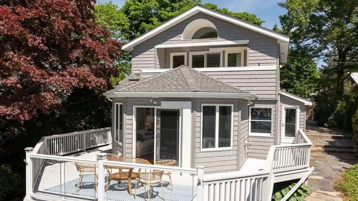 Charming Craftsman Exterior with a Beautiful Wraparound Deck