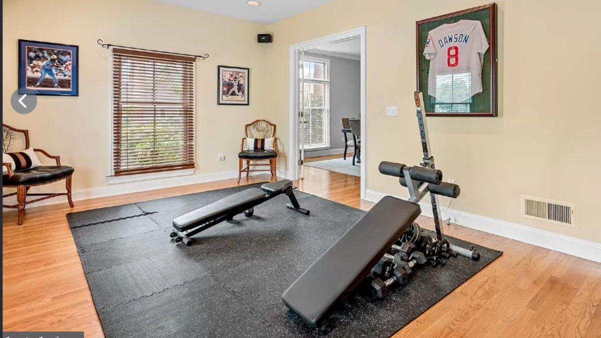Home Gym with Dual Benches and Athletic Decor