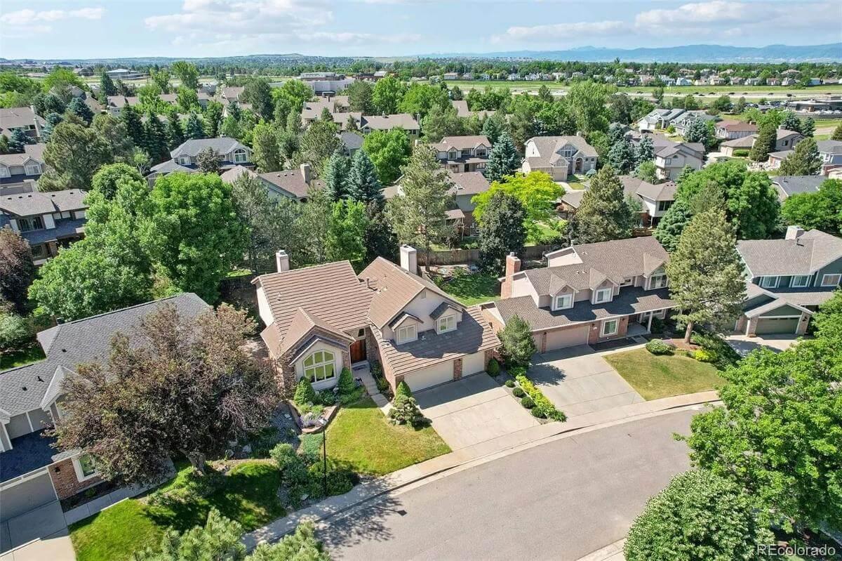 Imagine Strolling Through Lush Greenery in This Inviting Neighborhood