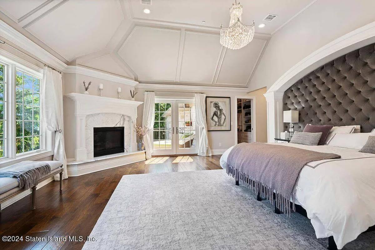 Experience the Grand Master Suite with Vaulted Ceilings and a Crystal Chandelier