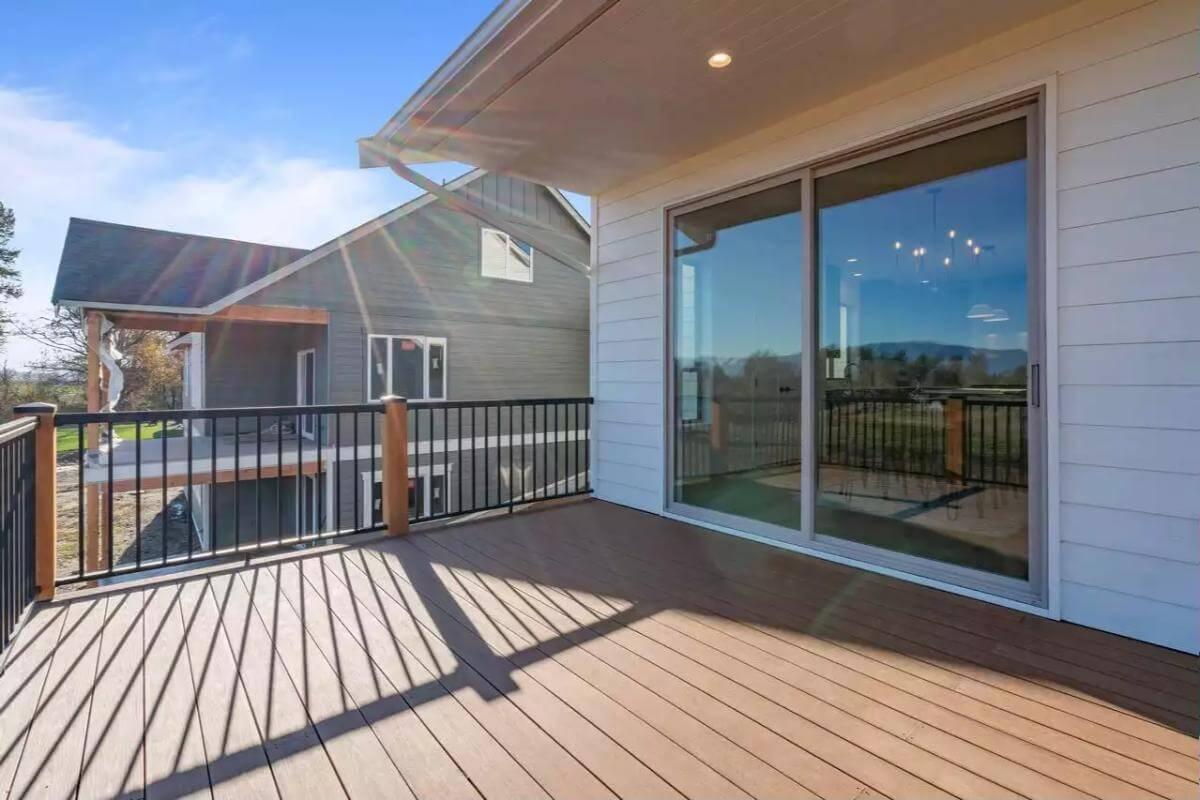 Embrace the View from This Spacious Craftsman Deck with Elegant Railings