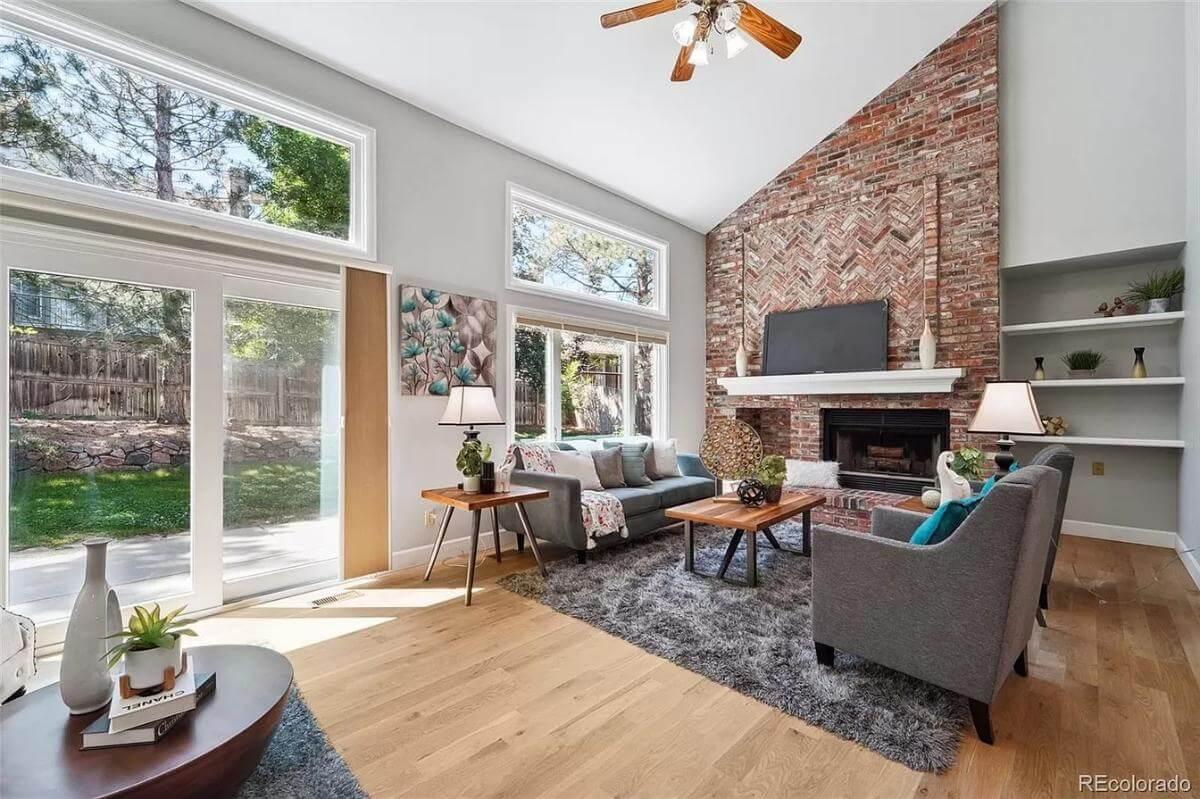 Brick Fireplace with Chevron Pattern Steals the Show in This Living Room