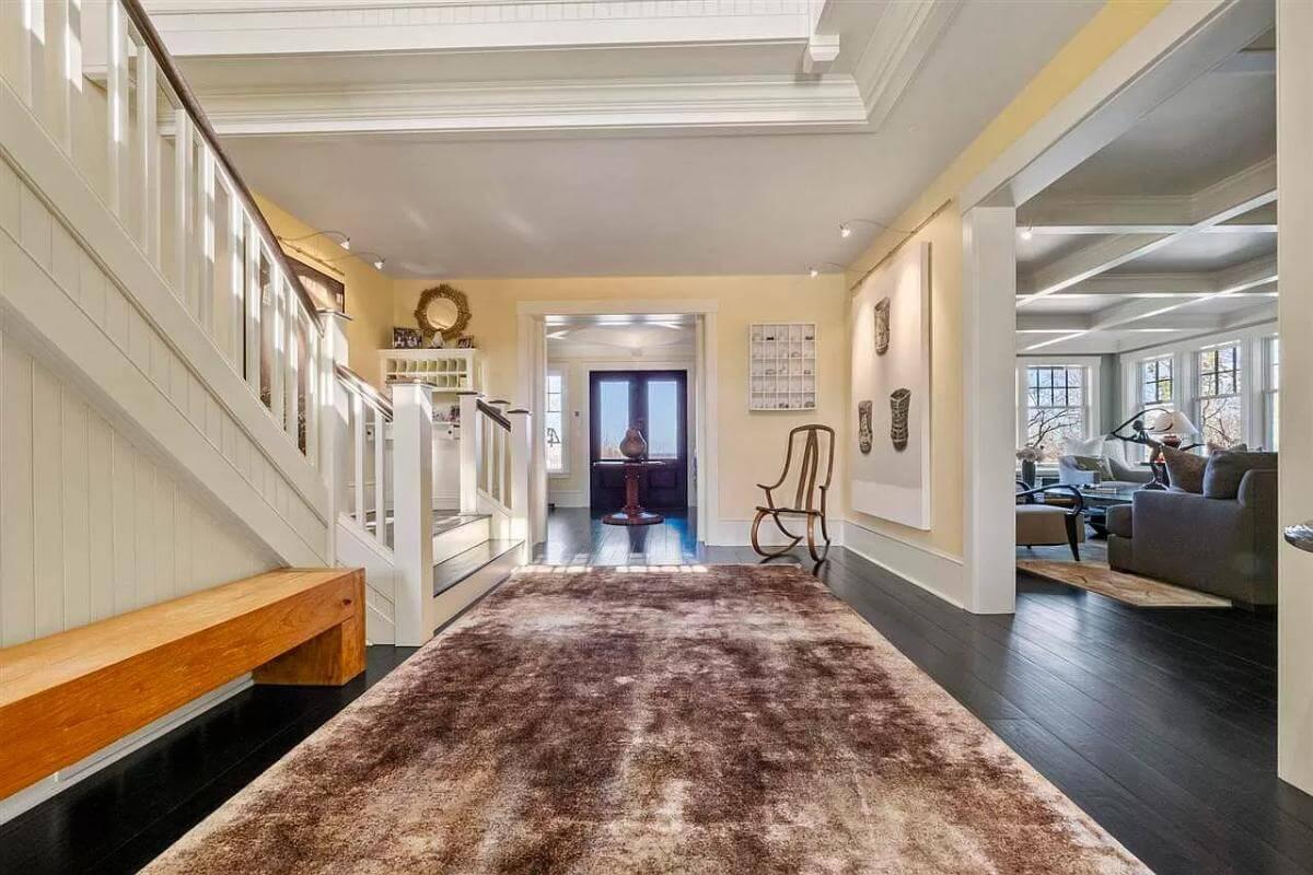 An Inviting Foyer with a Timeless Wooden Bench