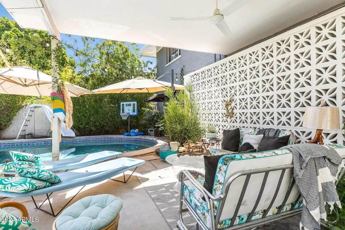 Retro Vibes Around the Pool with a Stylish Breeze Block Wall