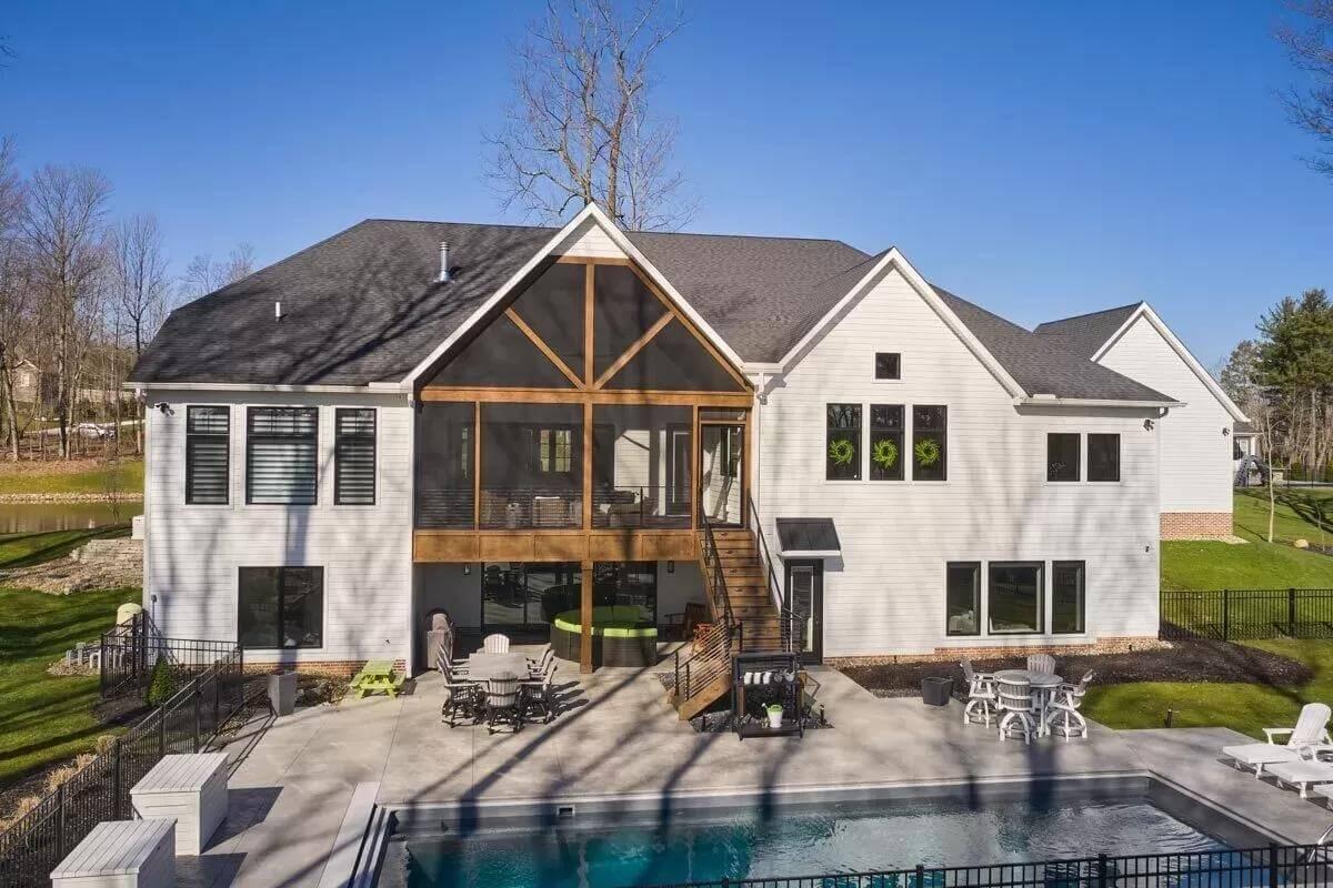 Check Out the Expansive Craftsman Backyard with Screened Porch and Poolside Retreat