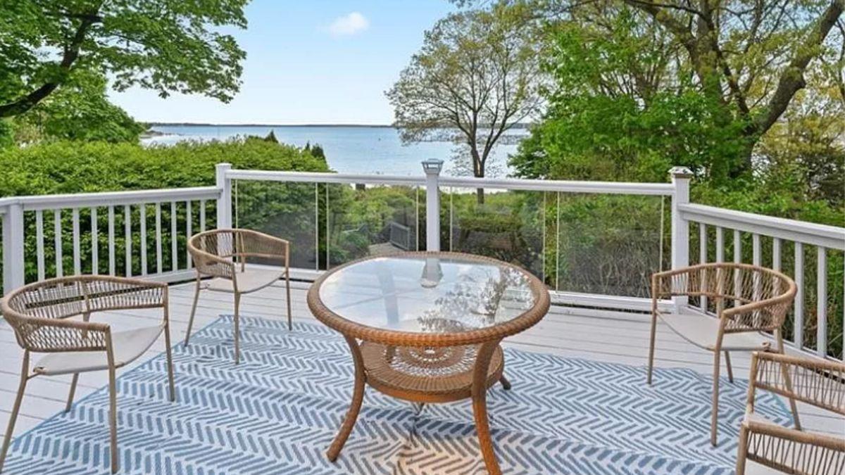 Relax on This Deck with Sea Views and Stylish Wicker Seating