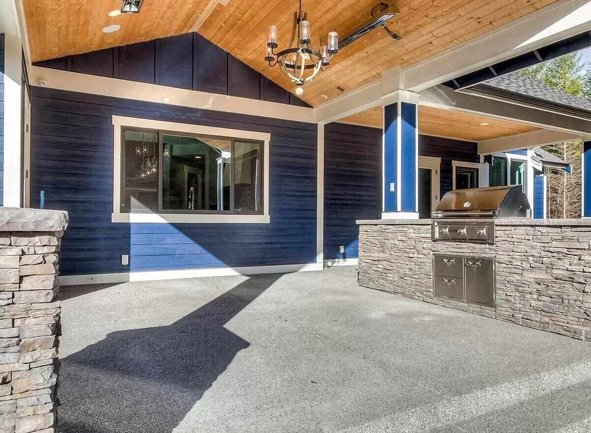 Wow, Check Out This Outdoor Kitchen with Stone and Timber Charm
