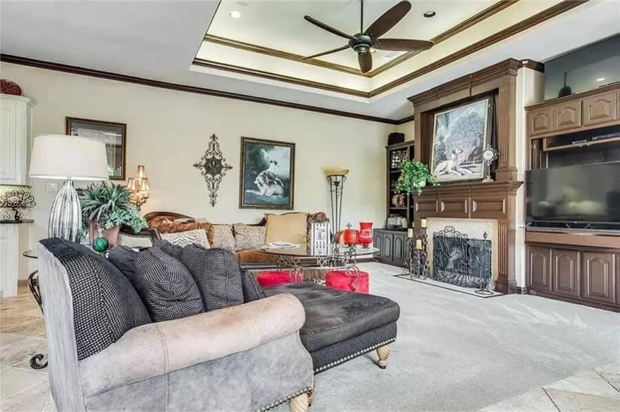 Classic Living Room with a Stunning Coffered Ceiling and Built-In Entertainment Center
