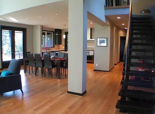 Modern Dining Area with Striking Open Staircase