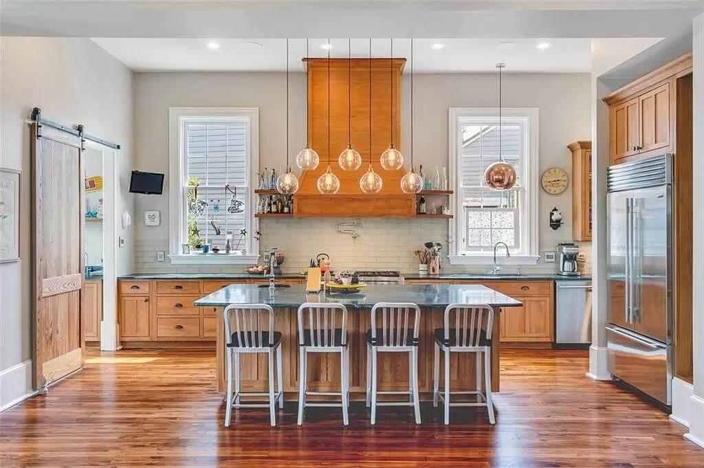 Wow, Look at Those Pendant Lights in This Warm Wooden Kitchen