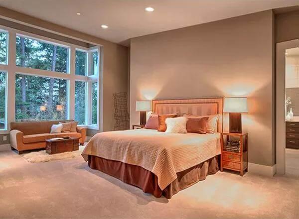 Master Bedroom with Forest Views and Warm Neutral Tones