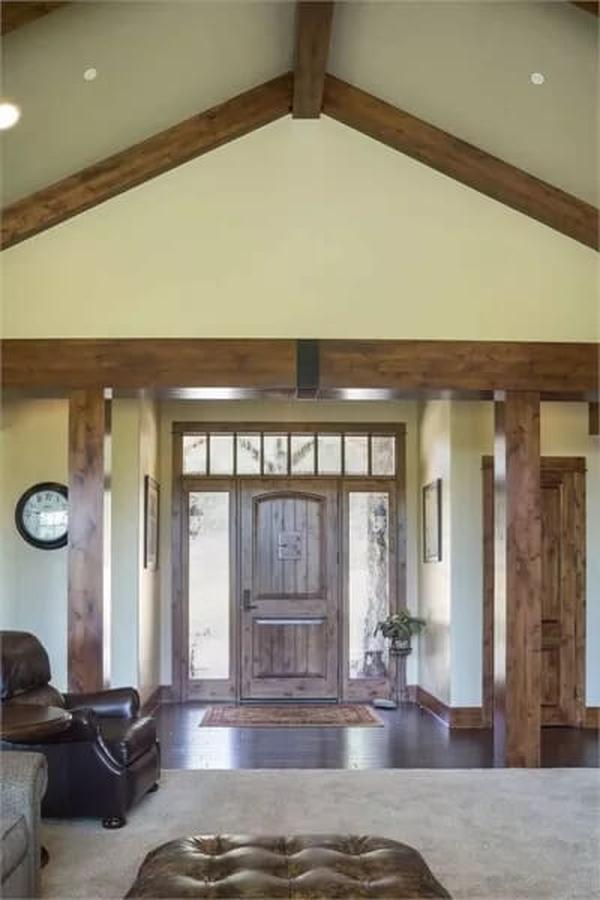 Notice the Vaulted Ceilings Paired with Rustic Wood Accents