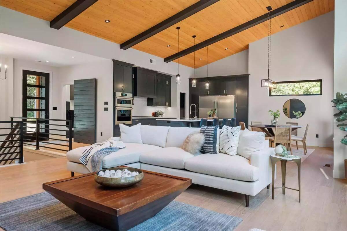 Explore the Charcoal Kitchen with Bold Beams Overhead