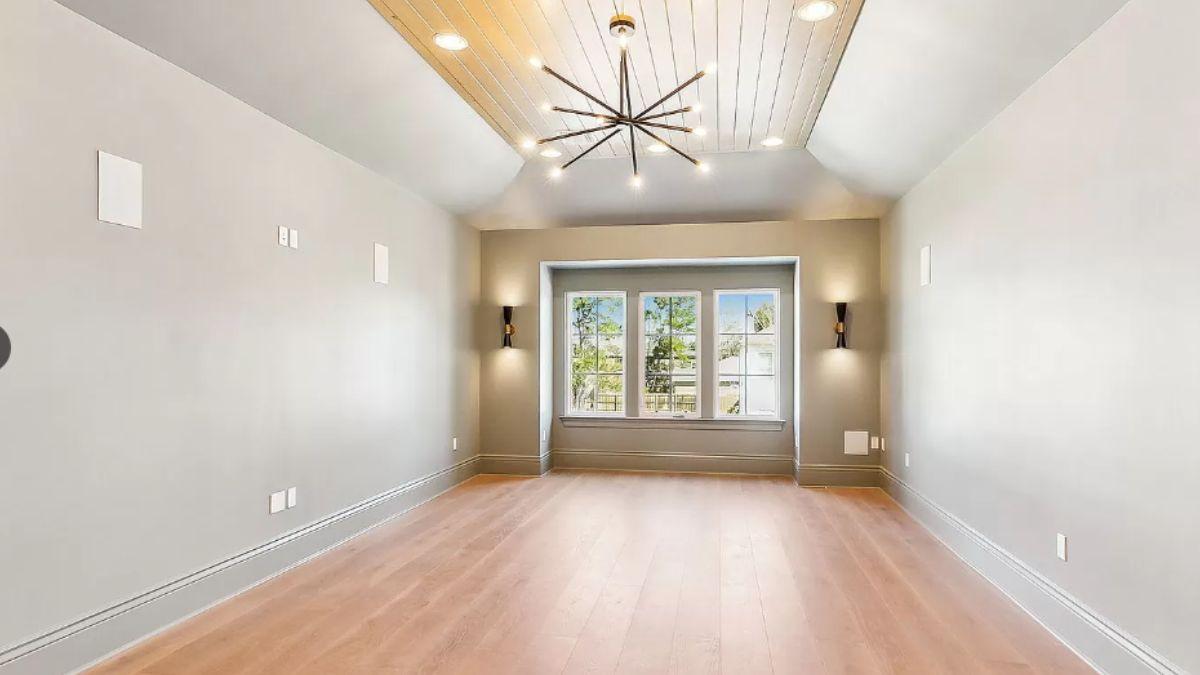 Focus on the Starburst Chandelier in This Elegant Neutral Room