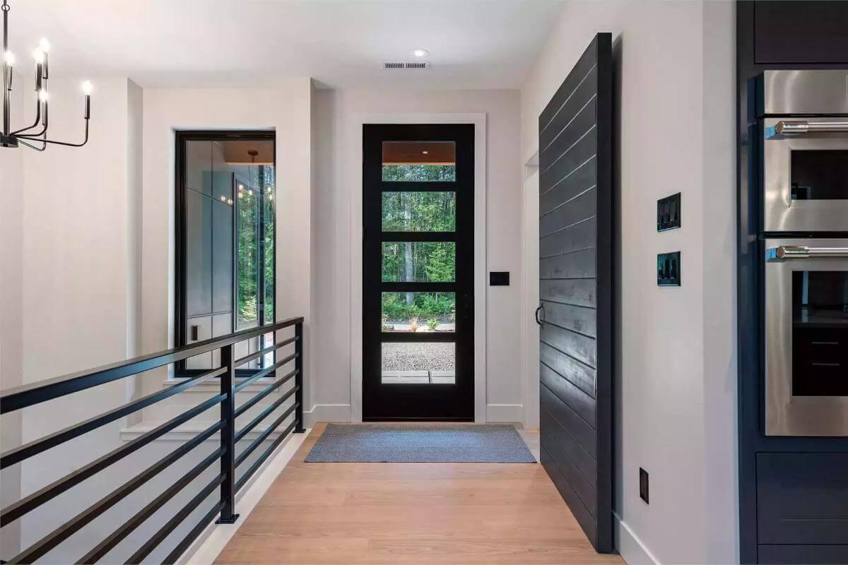 Wow, Check Out the Sleek Entryway with Glass Paneled Door