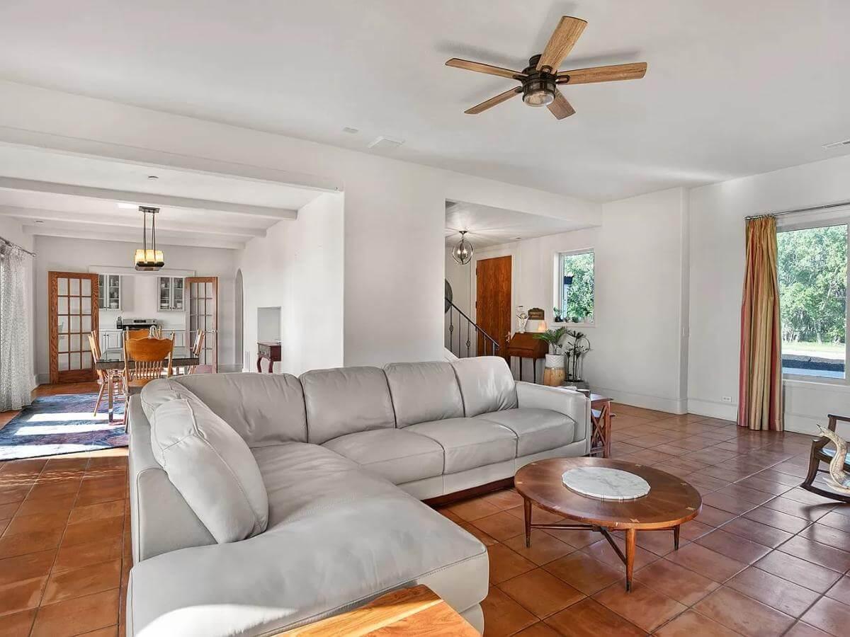 Spacious Living Room with Terracotta Tiles and Timeless Appeal