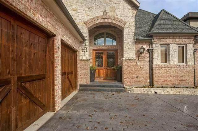 Admire the Grand Entryway under Timeless Stone Arches