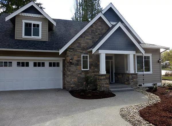 Charming Craftsman Facade with Dormer and Stone Detailing