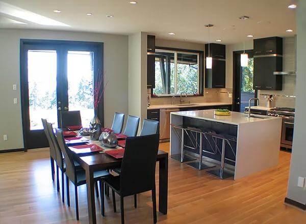 Sleek Kitchen with Striking Island and Open Dining Area